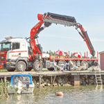 Zusammen mit dem Fassi-Kran F2150RAL auf dem Juhannus-Fest in Finnland