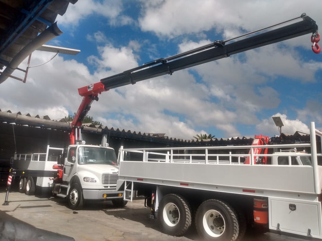 Three-Fassi-F385A-2-24-e-dynamic-articulated-cranes-installed-on-Torton-trucks-by-Eurogru-MX-3.jpg